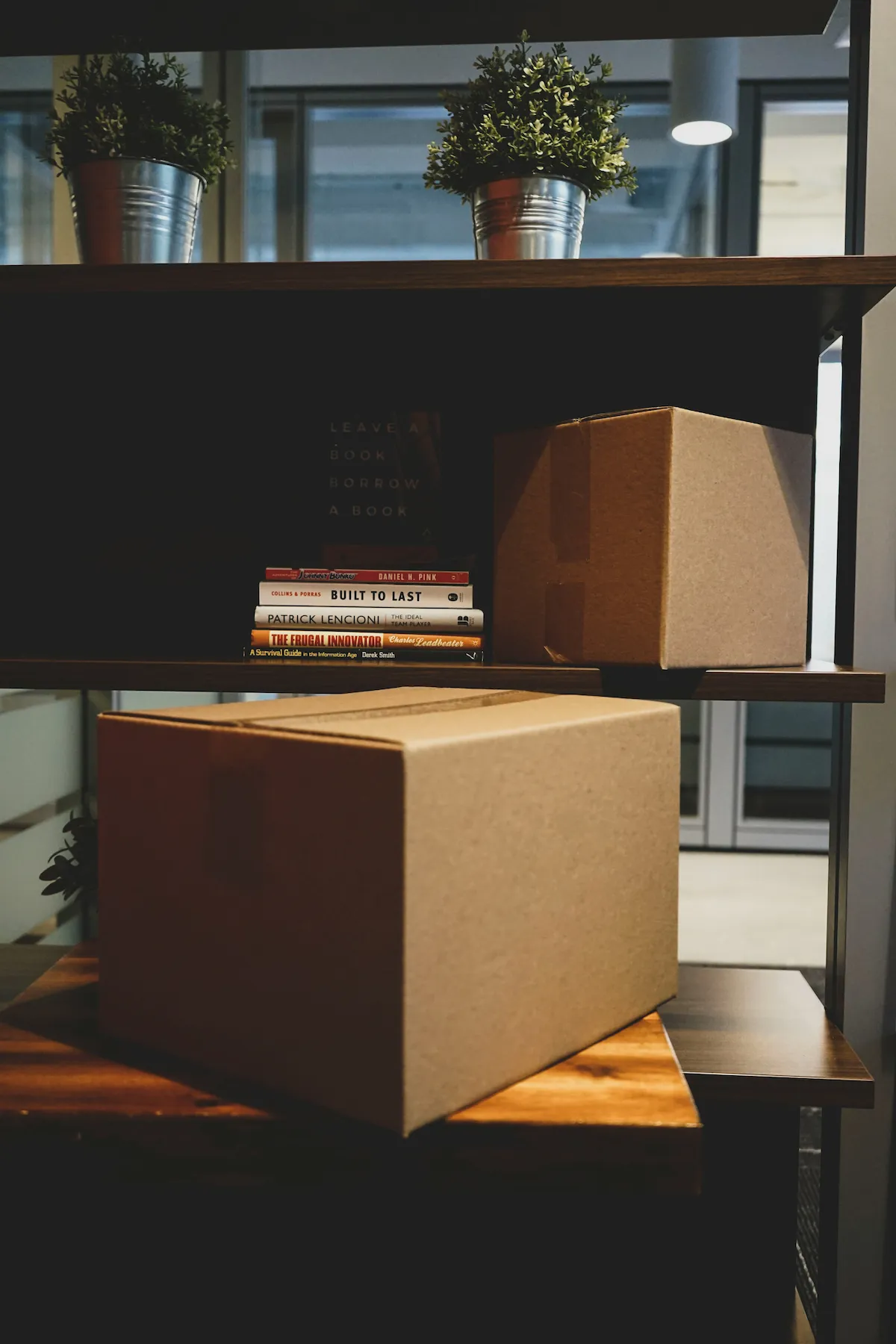 Moving boxes stacked in a room